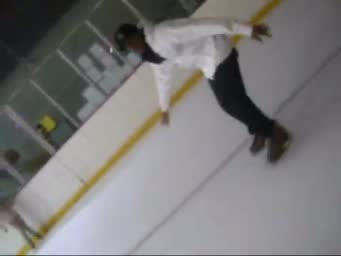 A single still frame of a person ice skating